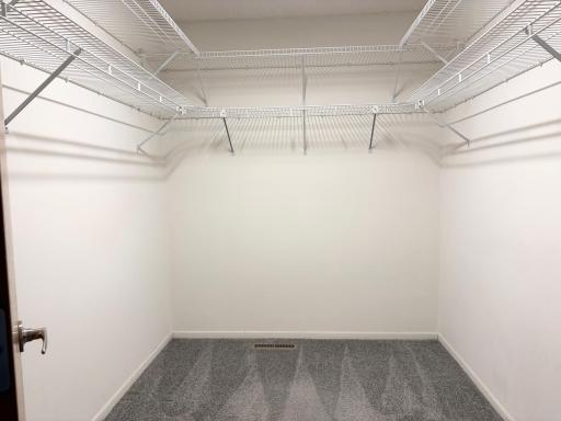 Large walk-in closet in owner's suite.