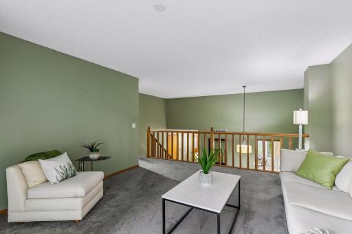 Upper level living room overlooking the dining room