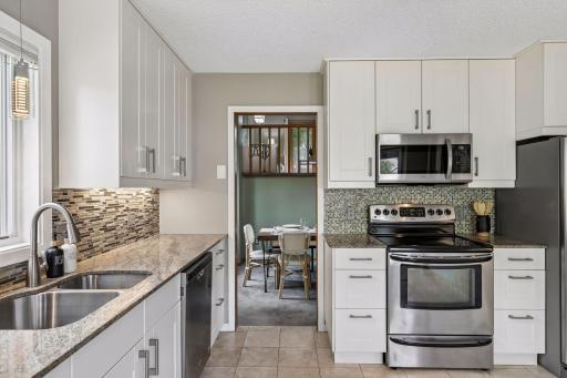 New kitchen in 2020 with granite countertops and stainless steel appliances