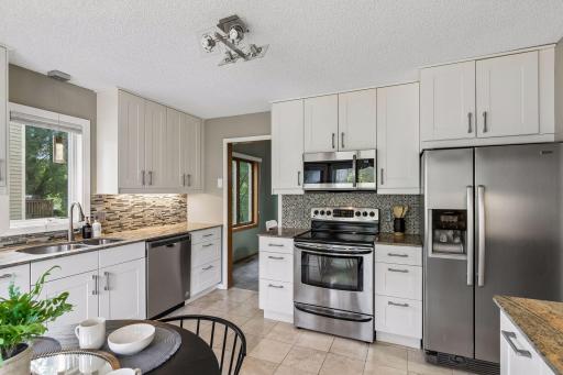 New kitchen in 2020 with granite countertops and stainless steel appliances