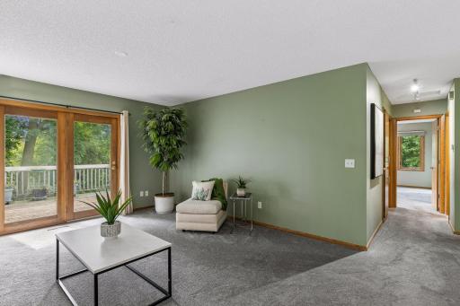 Upper level living room overlooking the dining room