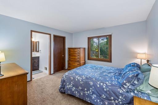 The primary suite offers easy main-level living with a walk-in shower. Behind the door, youâll find a spacious walk-in closet and main-level laundry.