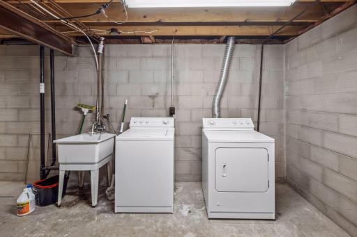 You'll find a utility room with additional washer and dryer in the lower level