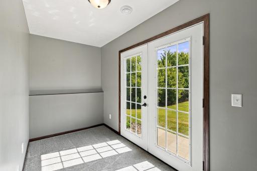 Walkout to large backyard backing up to pond and walking paths that lead to parks!
