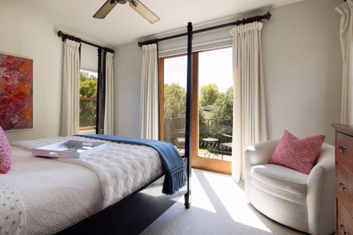 Step into the primary bedroom with access to the south-facing private balcony