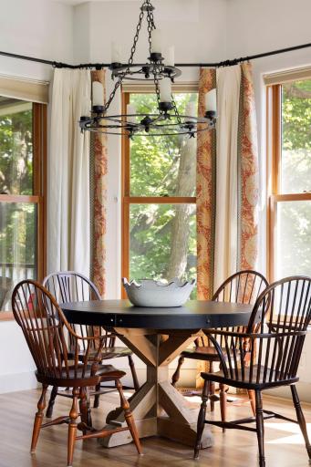 Enjoy effortless dining in the informal dining room with access to the screened-in porch