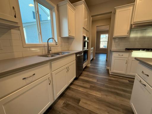 All photos of previously finished home of same floor plan.