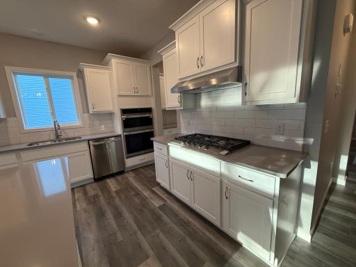 All photos of previously finished home of same floor plan.