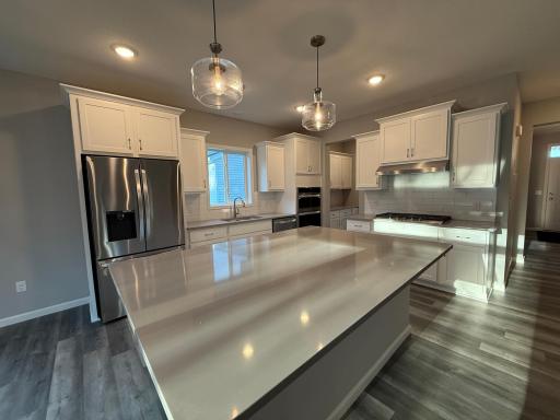 All photos of previously finished home of same floor plan.