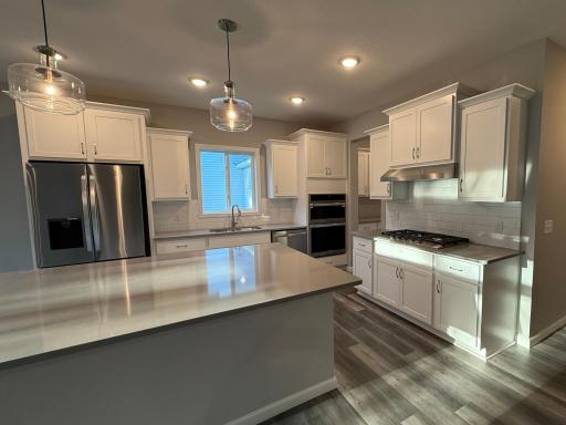 All photos of previously finished home of same floor plan.