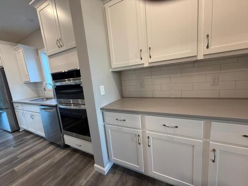 All photos of previously finished home of same floor plan.