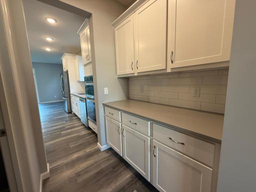 All photos of previously finished home of same floor plan.