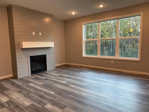 All photos of previously finished home of same floor plan.