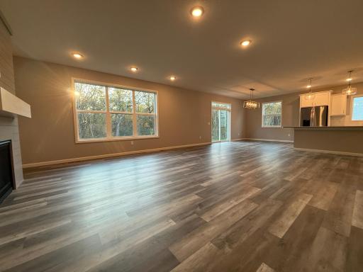 All photos of previously finished home of same floor plan.