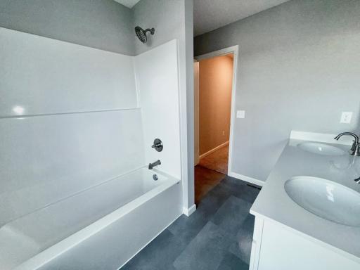 All photos of previously finished home of same floor plan.