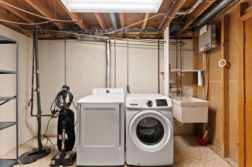 Lower level laundry room - possible space up in bathroom to move units - or convert one closet to laundry