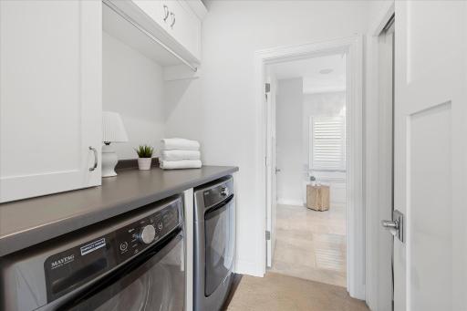 Private laundry in the primary bath
