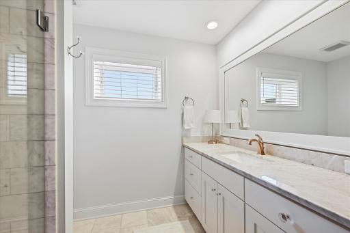 Tiled 3/4 bath in the lower level