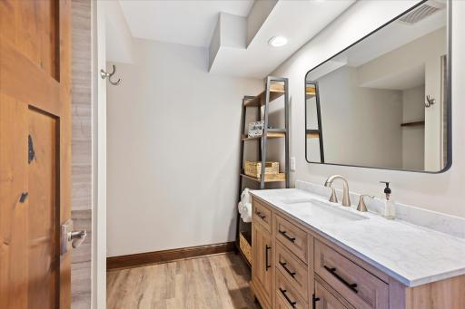Additional tiled 3/4 bath with in floor heat in the lower level