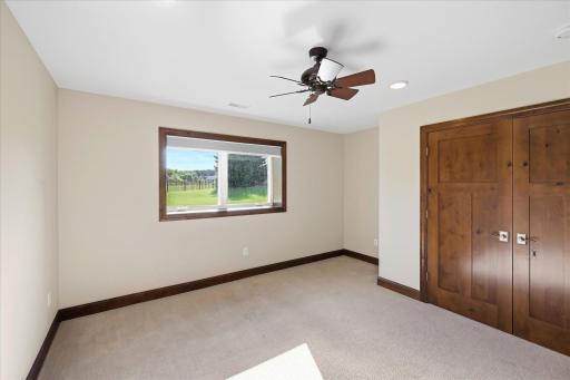 1 of 3 lower level bedrooms with upgraded millwork