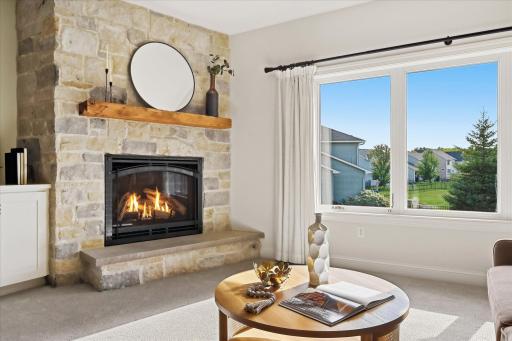 Gas fireplace with beautiful stone surround
