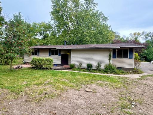 The back of the home had a deck and hot tub on the left side that was removed.