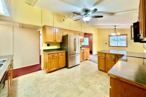 Same view point just a different angle of the whole kitchen and dining space.