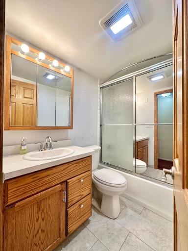 The second bath in the home is a full bath with ceramic tile flooring.