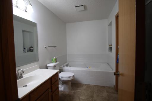 Main bath w/ tub & separate shower