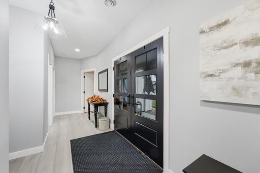 Smart Home technology. Universal design, wide hallways, 36'+solid-core doors, all solid-surface wide-plank LVP cork-back flooring and in-floor heat throughout. Rounded wall corners, granite window sills, dimmer switches, adjustable LED lighting.