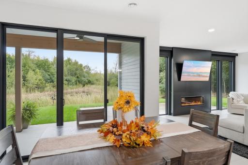 Wall of windows drenches the house with natural light.
