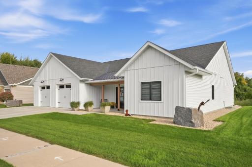 Quarry Woods was once an active granite mine. Relics of the past are on display, flanking each side of this home. Lush, flat yard surround the property with zone-irrigation. Covered porch is highligh with metal roof and wood beams & posts.
