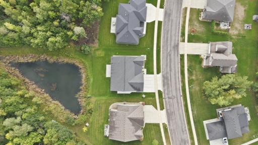 Ariel views. Notice sand-pad for future shed installation.