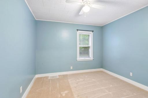 New carpet in the front bedroom facing Newton