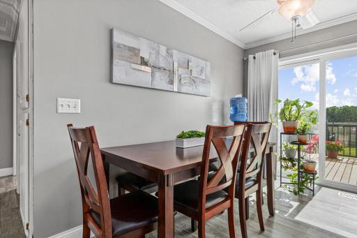 Dining room opens up to the kitchen and door to your deck