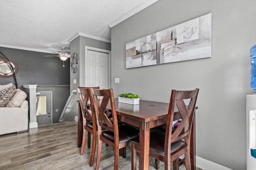Crown molding, ceiling fans, a brand new front door, updated trim work and doors!