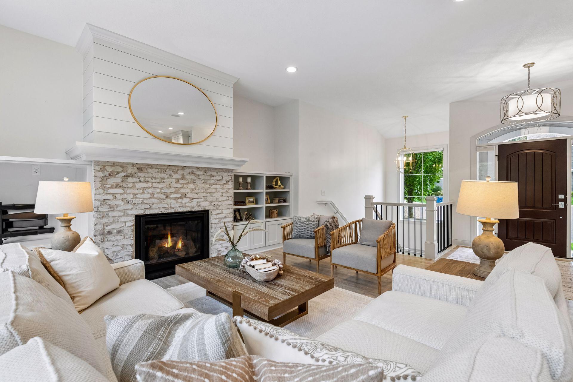 This home offers a fantastic floor plan with high ceilings and large windows that fill each space with natural light.