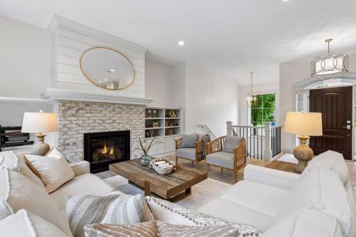 This home offers a fantastic floor plan with high ceilings and large windows that fill each space with natural light.