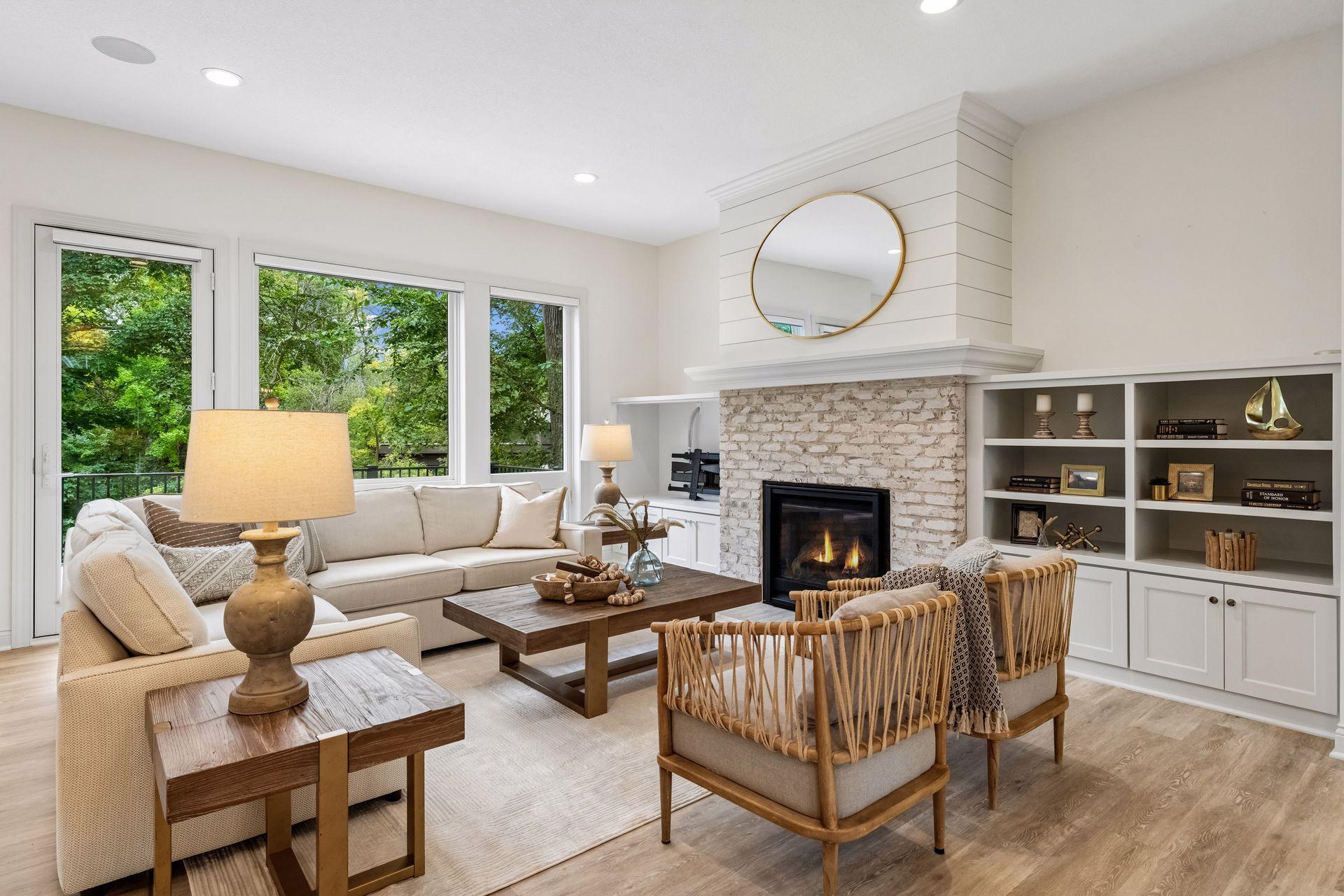 The inviting family room features a gas fireplace flanked by custom built-ins.