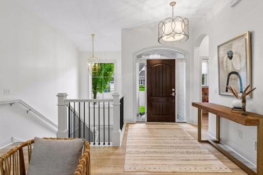 Step inside to discover a bright and open floor plan that has been beautifully updated with fresh paint, all new designer lighting and luxury vinyl flooring.