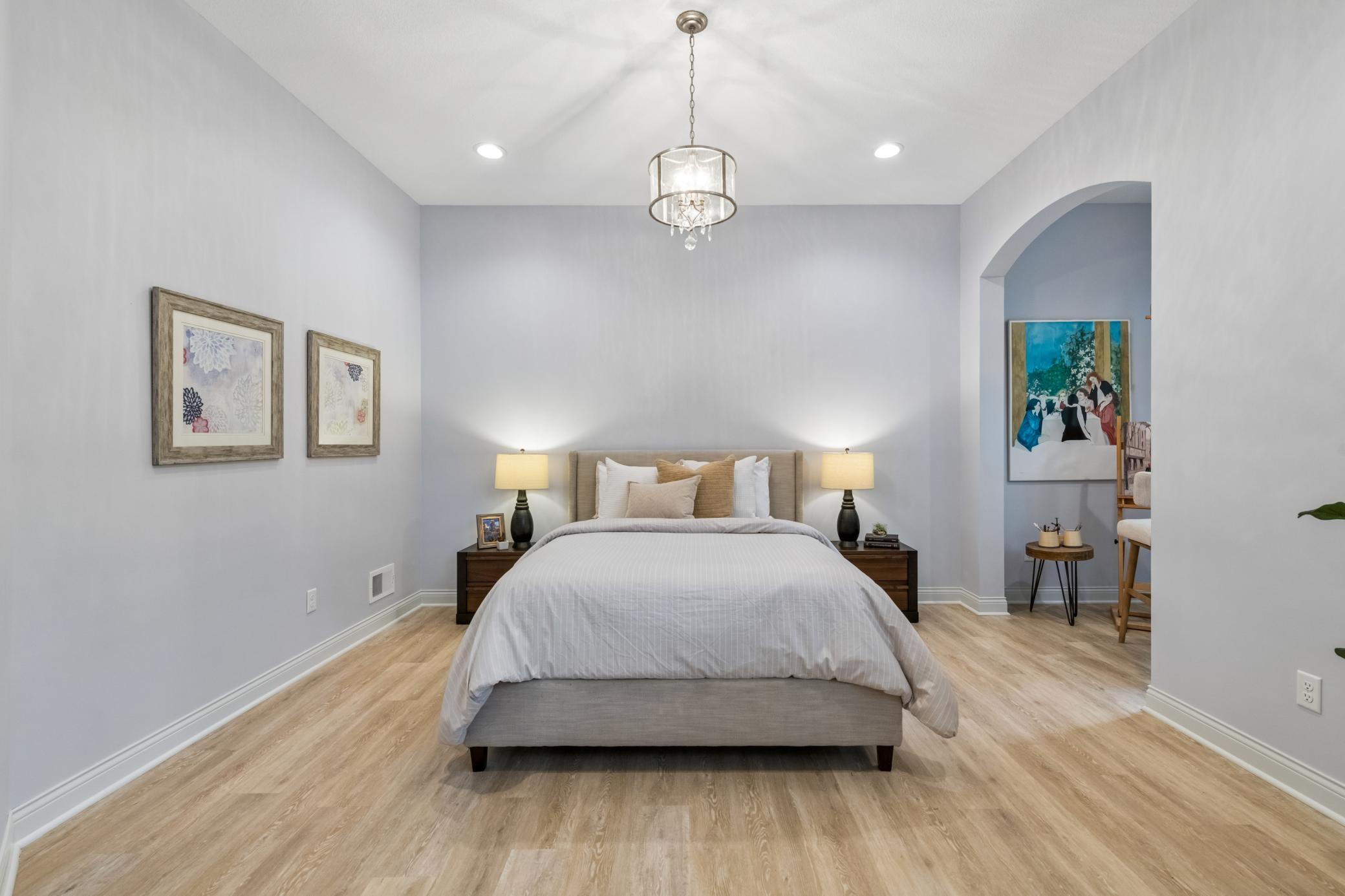 Tucked away on the main level, the Primary Bedroom offers a quiet sense of privacy.