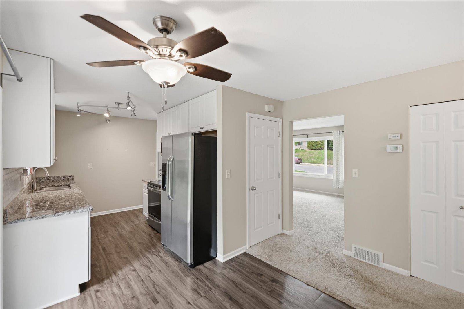 Dining towards kitchen and liviing room.jpg