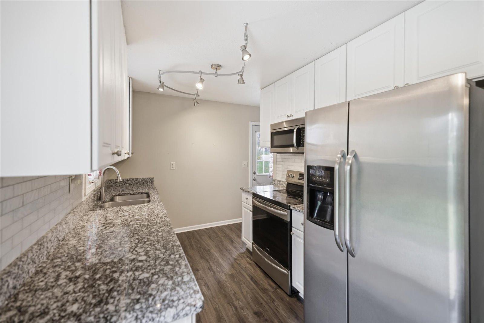 Kitchen towards side door..jpg