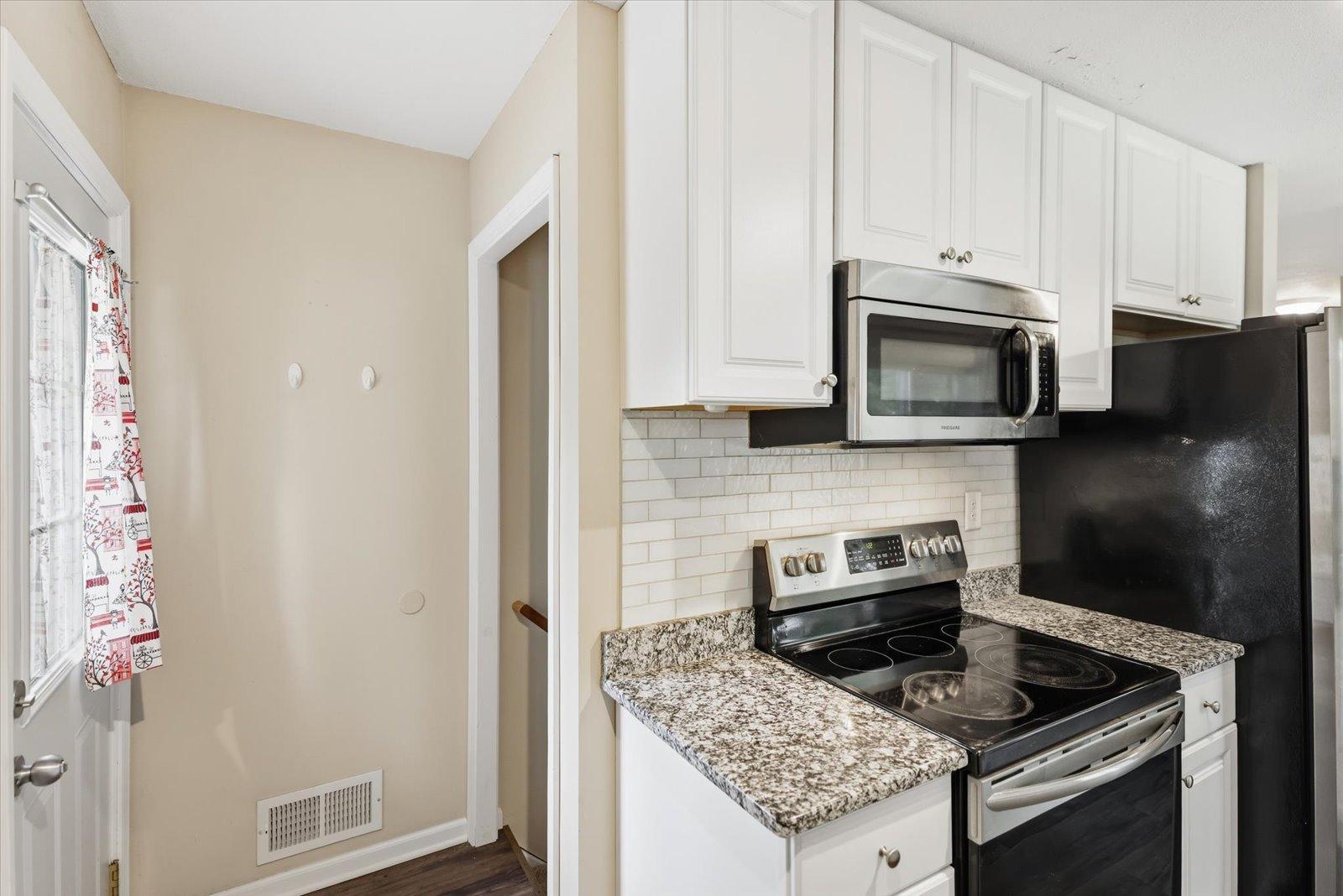Kitchen toward basement stair.jpg