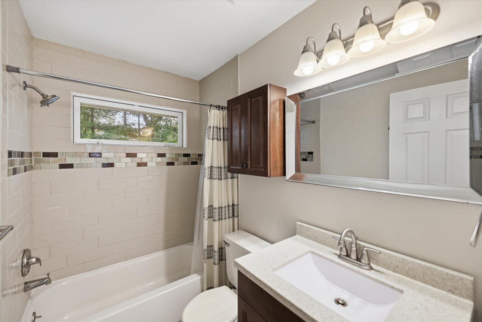 Main level bath - nicely updated.jpg