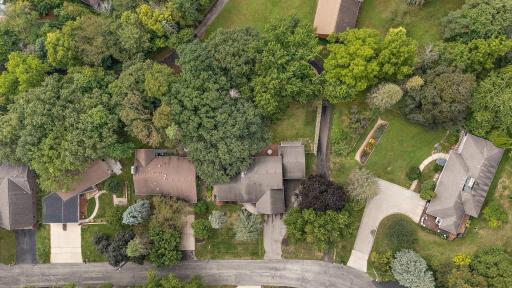 Can see the path on the west side of the home. City owned and maintained.