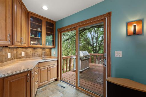 Access to upper deck for grilling - grill is hooked up to a gas line and stays with the home.