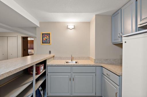Sink/plumbing is there and fridge does stay~