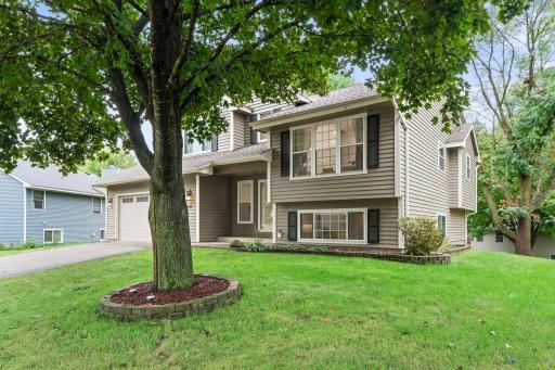 Beyond the easy access to parks, lakes, dining, and major roads, the setting offers something especially hard to find: a backyard that opens to mature trees and open greenspace, creating a private-feeling backdrop for everyday outdoor living.