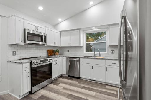 The kitchen was completely remodeled in 2025 with new cabinetry, countertops, sink, and fixtures.